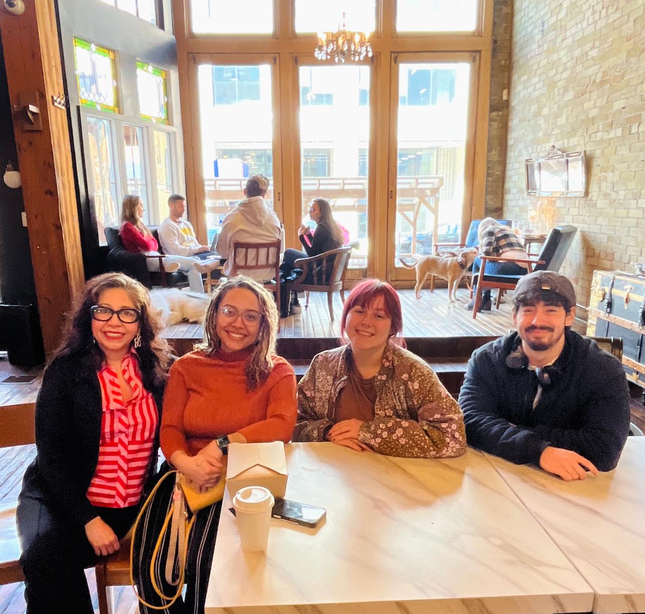 Rotaract Club of Milwaukee members at a casual cafe meetup