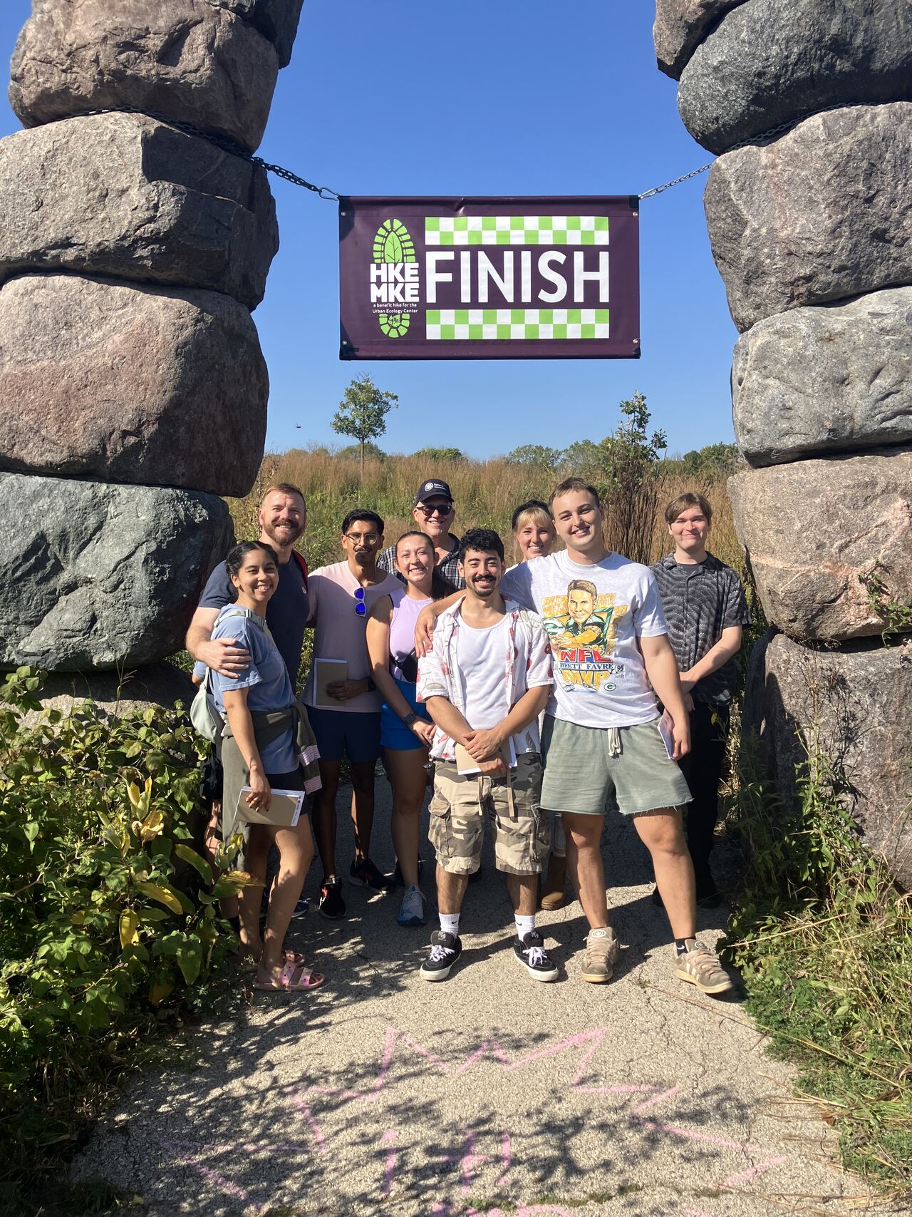 Rotaract Club of Milwaukee members finishing the Hike MKE benefit hike for the Urban Ecology Center